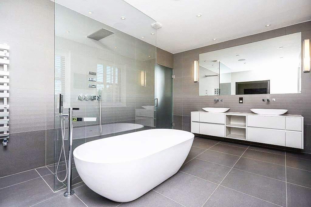 Bathroom with freestanding bath, wetroom and double vanity
